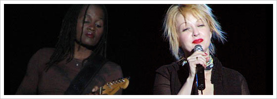 Cyndi Lauper and one of her guitarists